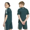 adidas-camiseta-de-manga-curta-junior-visitante-real-madrid-26-27-1.webp adidas - Camiseta de manga curta júnior Visitante Real Madrid 26/27 – Aurora Ivy