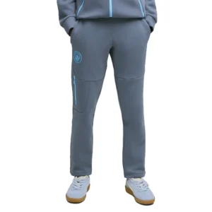 Puma - Calças de fato de treino para jovens Viagem Manchester City FC 26/27 Tech – Evening Sky / Luminous Blue