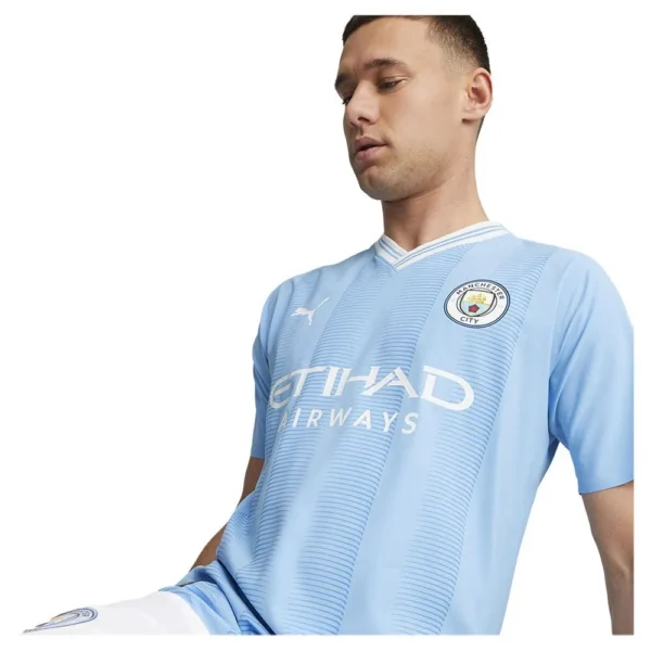 puma-camiseta-de-manga-curta-casa-manchester-city-fc-authentic-23-24-3.webp Puma - Camiseta de manga curta Casa Manchester City FC Authentic 23/24 – Feminino – Light Blue