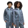 Puma - Moletom com zíper completo para crianças Viagem Manchester City FC 26/27 Tech Hoodie – Evening Sky / Luminous Blue